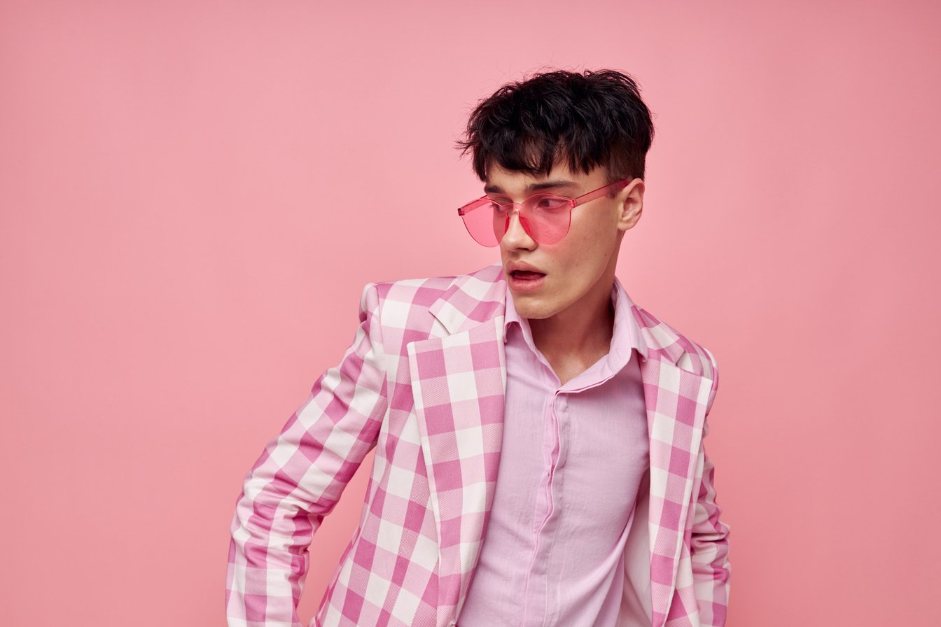 Handsome Guy Fashionable Pink Sunglasses Jacket Posing Pink Background Unaltered